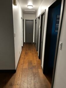 Painted hallway and doors, engineered hardwood floors